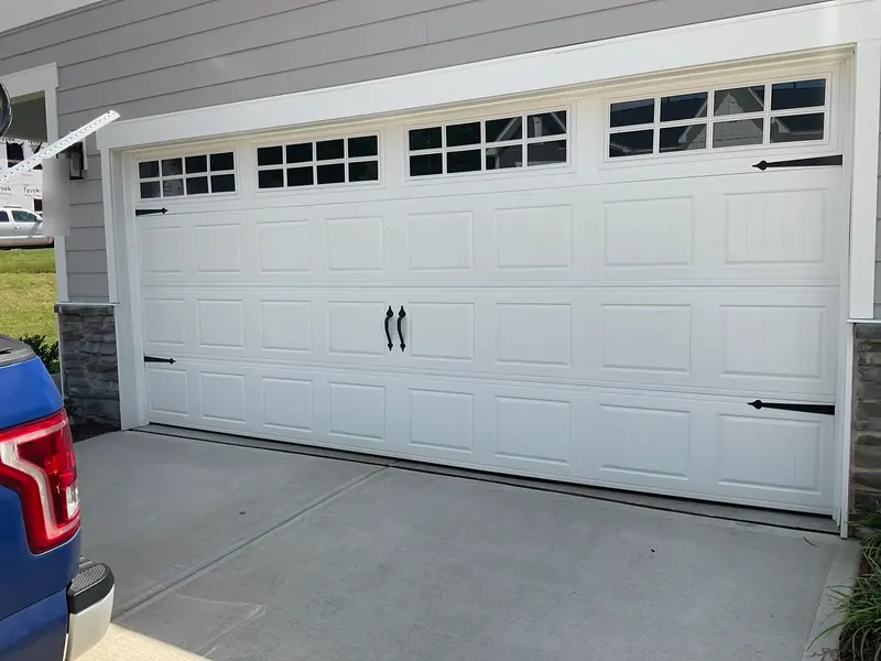 New white carriage-style double garage door